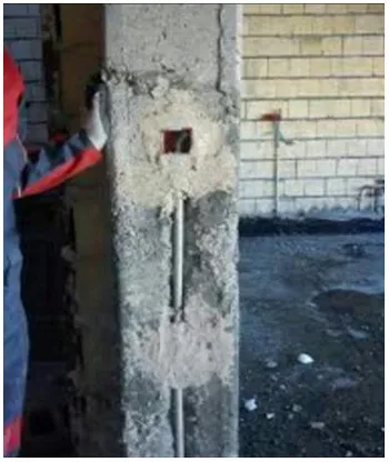 اشکالات اجرایی سازه بتنی؛ بررسی نواقص اجرایی ساختمان های بتنی(آپدیت 1405) 137 Figure 76 Demolition of the column cover to place the pipe and electrical